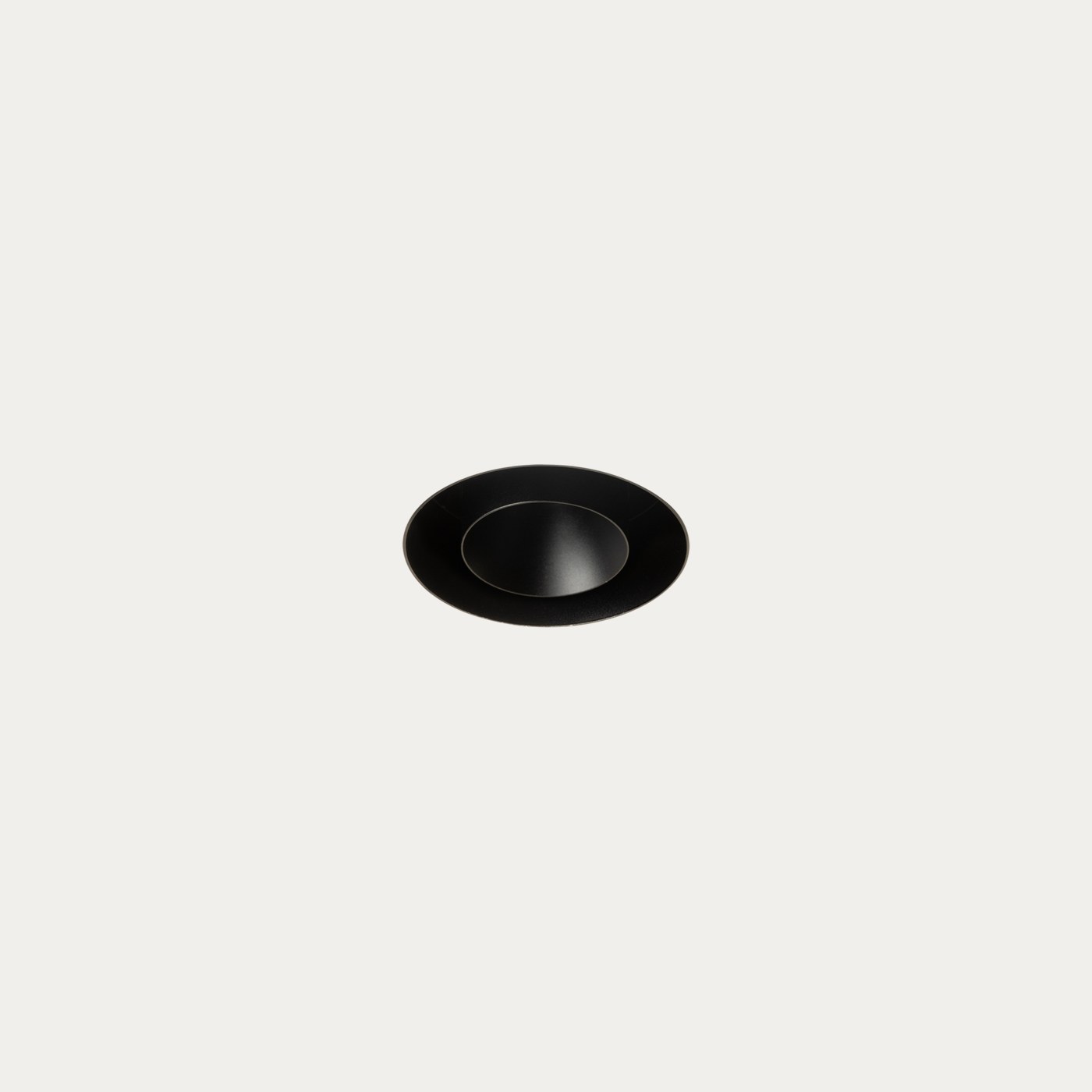 Black prado ceiling fitting combining light and an extract-air opening.